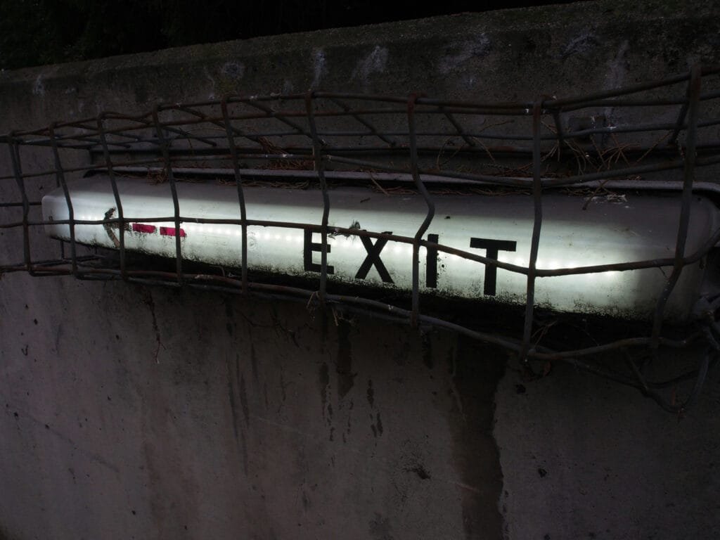 exit 8 movie explained the underground corridor scene